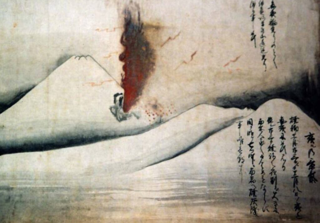 A woodblock print show red and black smoke emitting from Mt. Fuji's conical shape during the 1707 Hoei Eruption.
