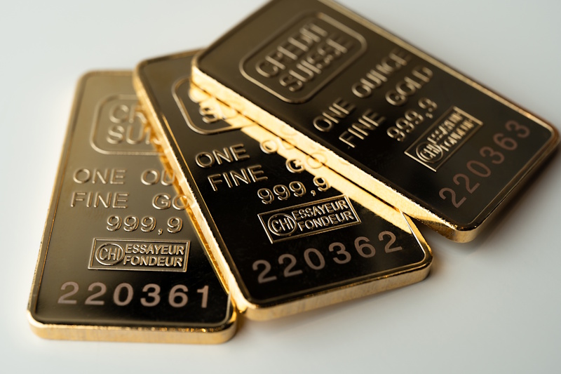 Three gold bars issued by Credit Suisse