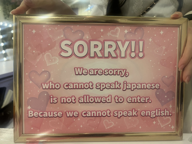 Sing: "Sorry!! We are sorry, who cannot speak japanese is not allowed to enter. Because we cannot speak english." 