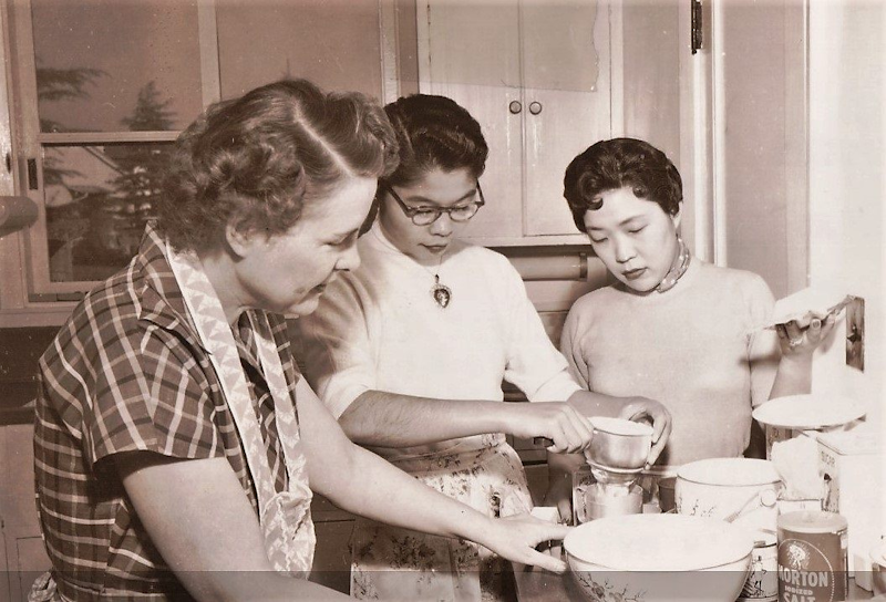 American woman teaches two Japanese women at a "war bride" school