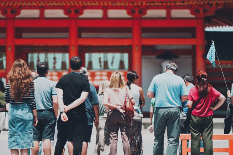Inbound tourists being led around in a tour group
