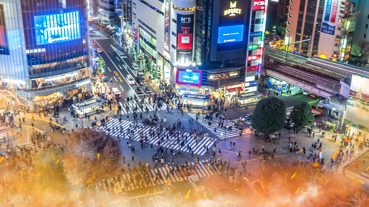 Shibuya Scramble with an image of fire bursting from the bottom