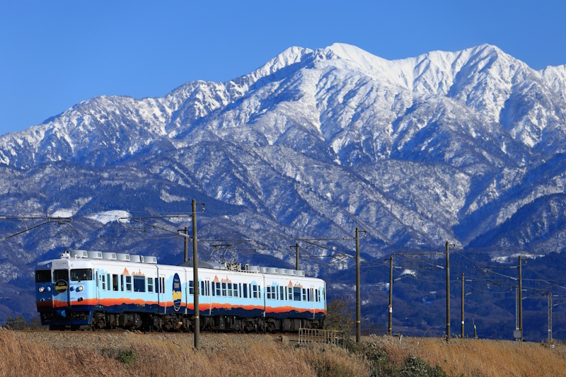 The Yama Train against a mountain backdrop