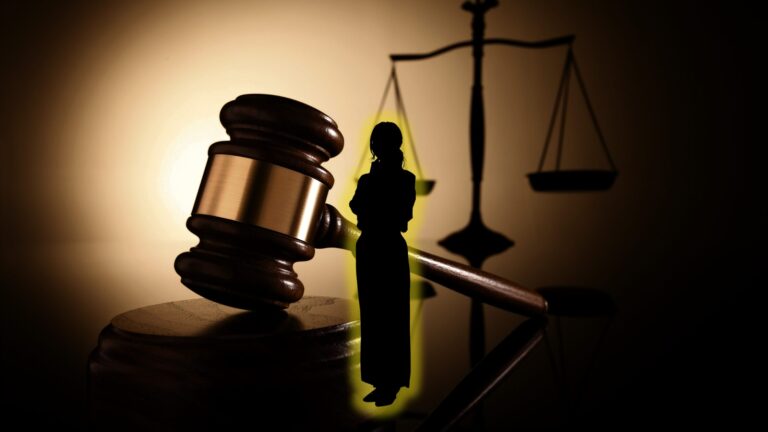 Woman in silhouette standing in front of an image of a gavel and scales