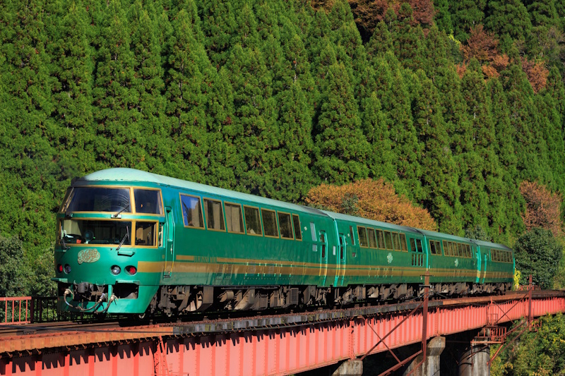 The Yufuin no Mori against a backdrop of evergreen trees