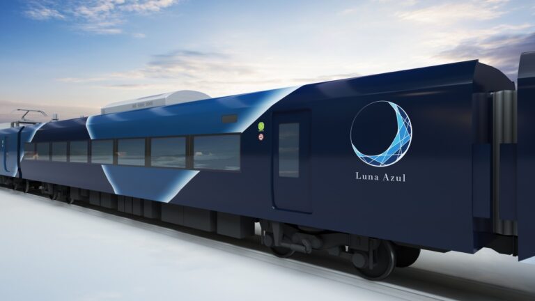 Rendering of JR East's Luna Azul train in two-tone blue livery, with its crescent-moon logo on the end car