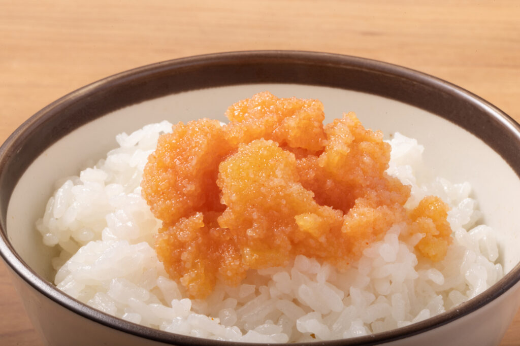 Bowl of white rice topped with a mound of mentaiko pollock roe